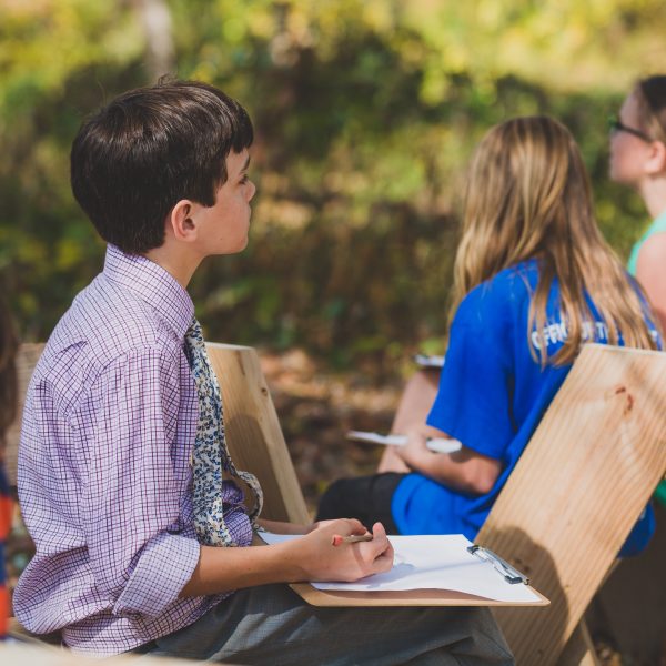 Student studying in nature